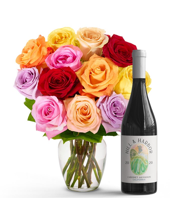 One Dozen Rainbow Roses with Red Wine - The Gift Basket Store