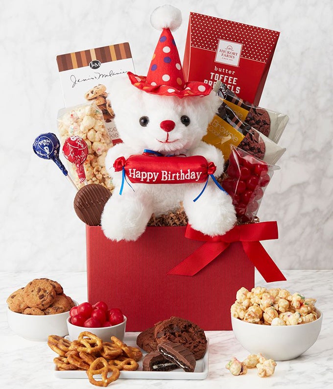 Birthday snack box delivered with a happy birthday teddy bear
