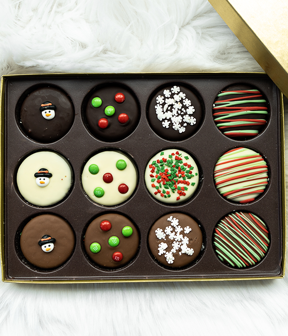 Christmas chocolate covered Oreos with holiday sprinkles