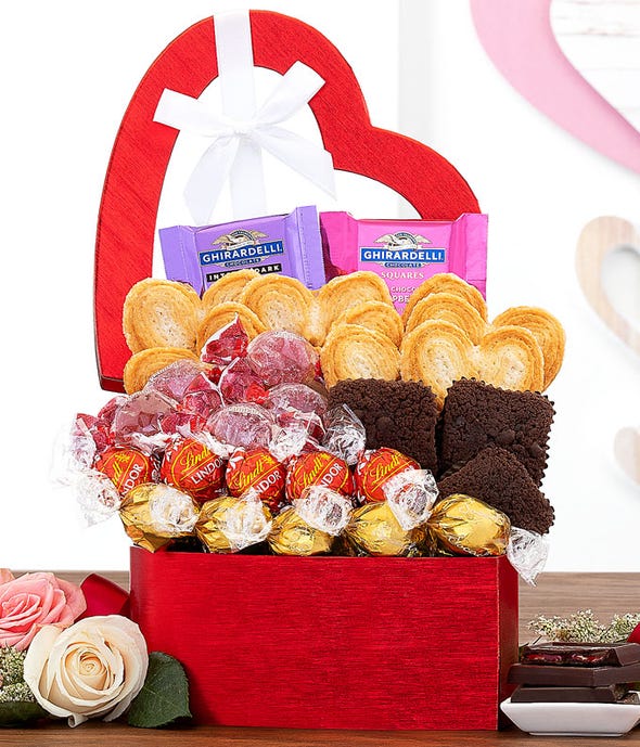Heart shaped Valentine&#39;s Day box filled with treats