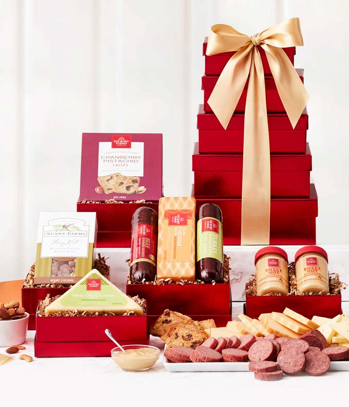 Gourmet food tower delivered with meat, cheese, crackers and sauces