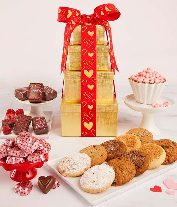 Valentine&#39;s Day cookies and treats in gift boxes with heart ribbon